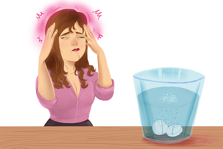 The solution to her headache was to dissolve two headache pills in a glass of water and drink it quickly.